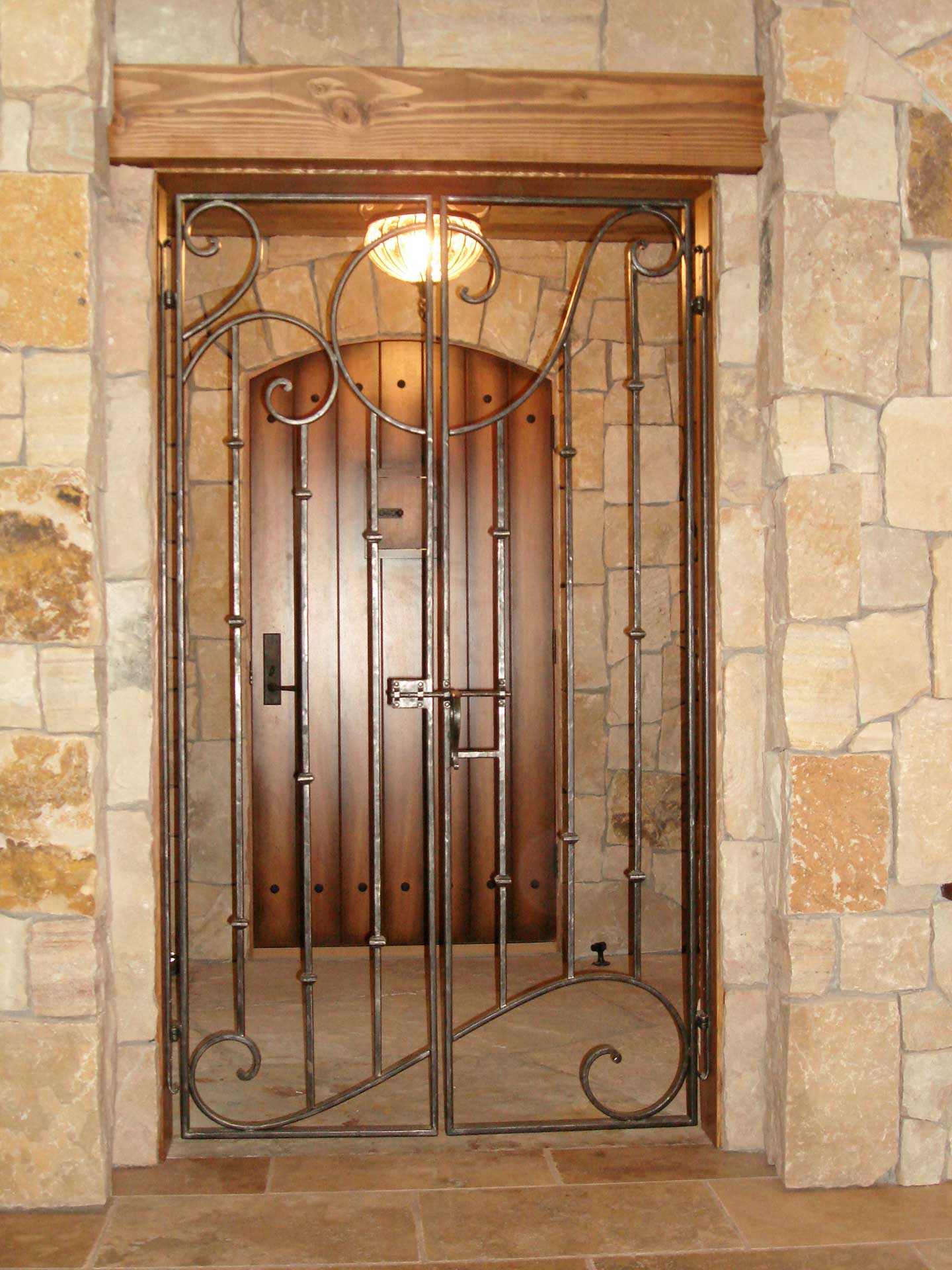 Photo of Brauner project, Iron gate in front of wooden door