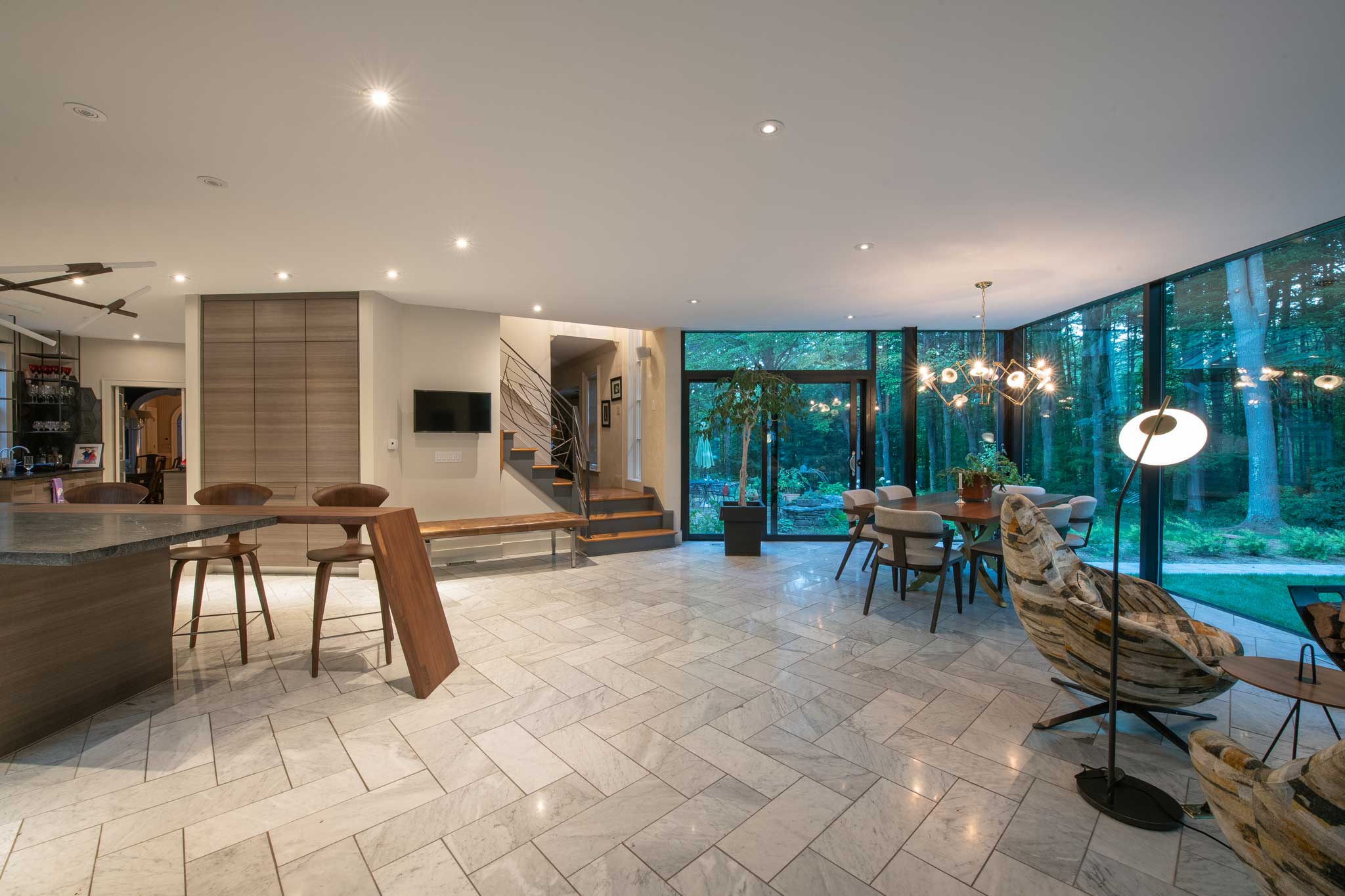 Interior view of the home addition showing the modern decor and angled tile floor design.