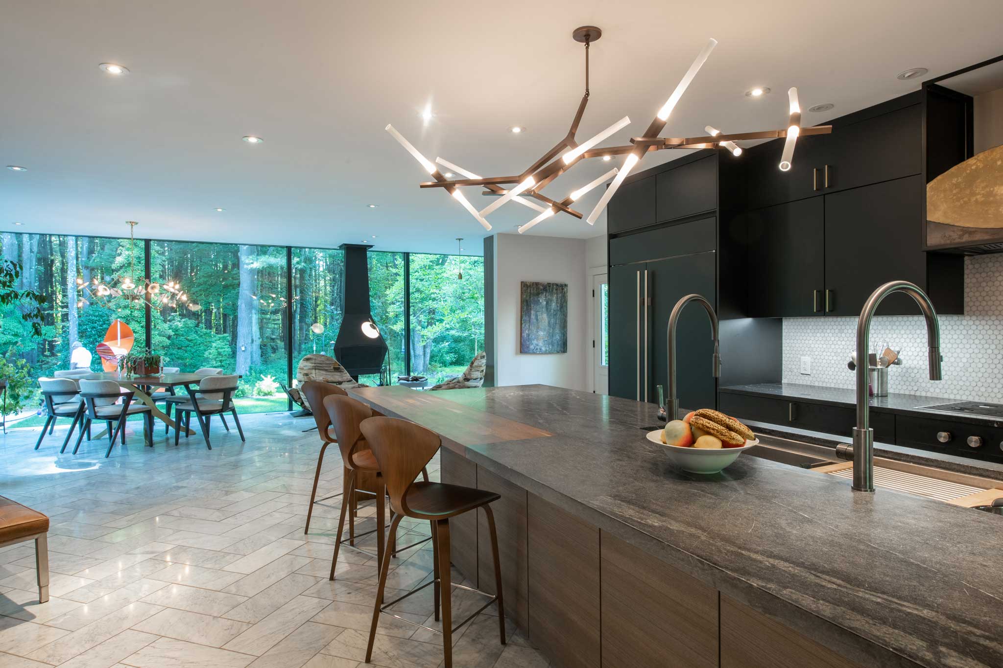 Modern Addition showing modern lighting over the kitchen bar.